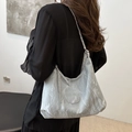 Silver blue hobo shoulder bag featuring a metallic crinkle texture and woven chain strap - No Pendant / Blue