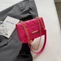 Hot pink quilted crossbody bag with a gold metal chain strap and rectangular lock - Rose Red