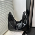 Glossy black hobo bag with adjustable wide strap and metallic silver hardware details - Black without Pendant / Black (Without Charm)