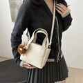 Minimalist beige bucket tote bag in lychee pattern leather with plush bear charm - White with Pendant