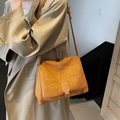 Retro mustard yellow faux suede crossbody bag with flap and decorative leather strap - Brown