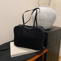 Minimalist black suede tote bag with shoulder straps and silver zipper closure - Black