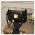 Minimalist black matte leather shoulder bag with a gold square lock and knotted strap detail - Black