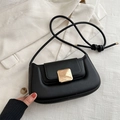 Minimalist black matte leather baguette bag with gold metal buckle and knotted strap detail - Black