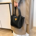 Minimalist black leather crossbody tote with iconic golden triangular metal logo - Black without Pendant