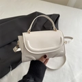 Minimalist beige leather square handbag with top handle and crossbody strap - White