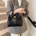 Large black handbag with crocodile texture and gold metal rings for women - Black