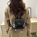 Sac à dos mode pour femme avec motif léopard, cordon de serrage et logo doré élégant - Noir