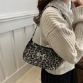 Leopard print underarm bag with silver metallic bow detail and matching strap - Leopard Black