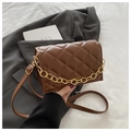 Close-up of brown quilted faux leather mini bag with gold chain and crossbody strap - Coffee
