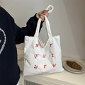 White corduroy tote bag with red embroidered letters and long handles for women - White