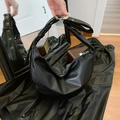 Chic black crescent-shaped underarm bag in soft leather with silver eyelet strap - Black
