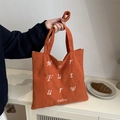 Orange corduroy tote bag with white letter embroidery for daily commute and casual use - Orange