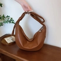 Brown hobo shoulder bag in crescent shape with silver zipper and wide strap - Brown