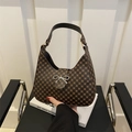 Deep brown crescent underarm bag with circular patterns and silver bow buckle - Brown