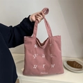 Pink corduroy tote bag with white letter embroidery for a casual aesthetic look - Pink