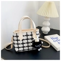 Detail of tweed checkered tote bag with beige leather trim and plush monster charm - With Pendant / Off White