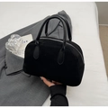 Detail of black suede bowling bag with silver zipper and smooth leather dual handles - Black