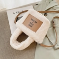 Chic beige faux fur tote bag with brown leather patch and adjustable shoulder strap - White