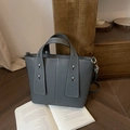 Dark grey lychee leather handbag with white stitching and detachable gold shoulder strap - Gray