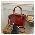 Chic burgundy bucket bag with glossy finish and gold metal hardware detailing - Red (No Pendant)