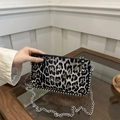 Chic leopard print crossbody bag with silver punk rivets and adjustable chain strap - Black