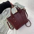 Chic burgundy lychee texture bucket bag with gold rivets and detachable strap - Burgundy
