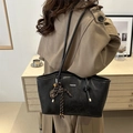 Black vintage leather tote bag with white FASHION print and woven charm detail - With Rope Pendant / Black