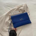 Minimalist royal blue envelope clutch with silver metal bow and wristlet strap - Blue