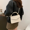 Stylish white crocodile pattern flap crossbody handbag with golden metal hardware detail - White