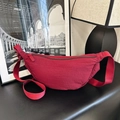Wine red nylon crescent crossbody bag with adjustable strap and textured finish - Red