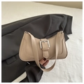 Detail of beige underarm bag with silver square buckle and smooth leather finish - Khaki