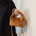 Brown fluffy plush handbag with dark brown leather handles and gold chain charm - Brown