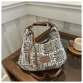 Detail of grey geometric woven bucket bag with brown leather handles and logo plaque - No Pendant / Brown