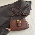 Dark brown leather underarm bag with gold buckle and knotted shoulder strap detail - Brown