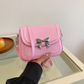 Borsa a tracolla rosa con fiocco argentato e finitura in ecopelle liscia da donna - Rosa