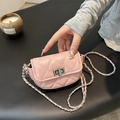 Chic pink quilted mini crossbody bag with silver chain strap and metal turn-lock closure - Pink