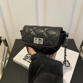 Mini black quilted crossbody bag with silver twist lock and woven chain strap - Black