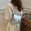 Mini silver metallic backpack with buckle closure and stylish textured finish - Silver