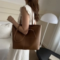 Brown large capacity tote bag with white contrast stitching and front pocket detail - Brown