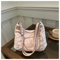 Close-up of pink pleated tote bag with colorful embroidery and silver metal chain strap - Pink Without Pendant