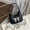 Mini black leather handbag with silver metal bow decoration and chain shoulder strap - Mini Black
