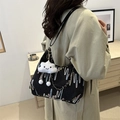 Black canvas tote bag with colorful wave embroidery and white cloud plush charm - Black With Cloud Pendant