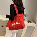 Schicke rote Shopper-Tasche mit weißem FASHION-Aufdruck und praktischer Seitentasche - Rot