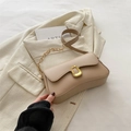 Minimalist apricot faux leather crossbody bag with gold geometric buckle and chain strap - Khaki