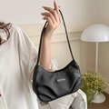 Black pleated nylon hobo bag featuring crescent shape and oval fashion leather label - Black