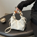 White marble pattern handbag with colorful beads handle and drawstring closure - White