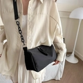 Minimalist black crossbody bag with wide strap and chain detail for daily commuting - Black