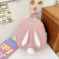 Schattige roze studentenrugzak met decoratieve konijnenoren en een witte pluche pomponstaart - Roze