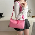 Barbie pink cylindrical crossbody bag in nylon with wide strap and acrylic chain - Rose Pink